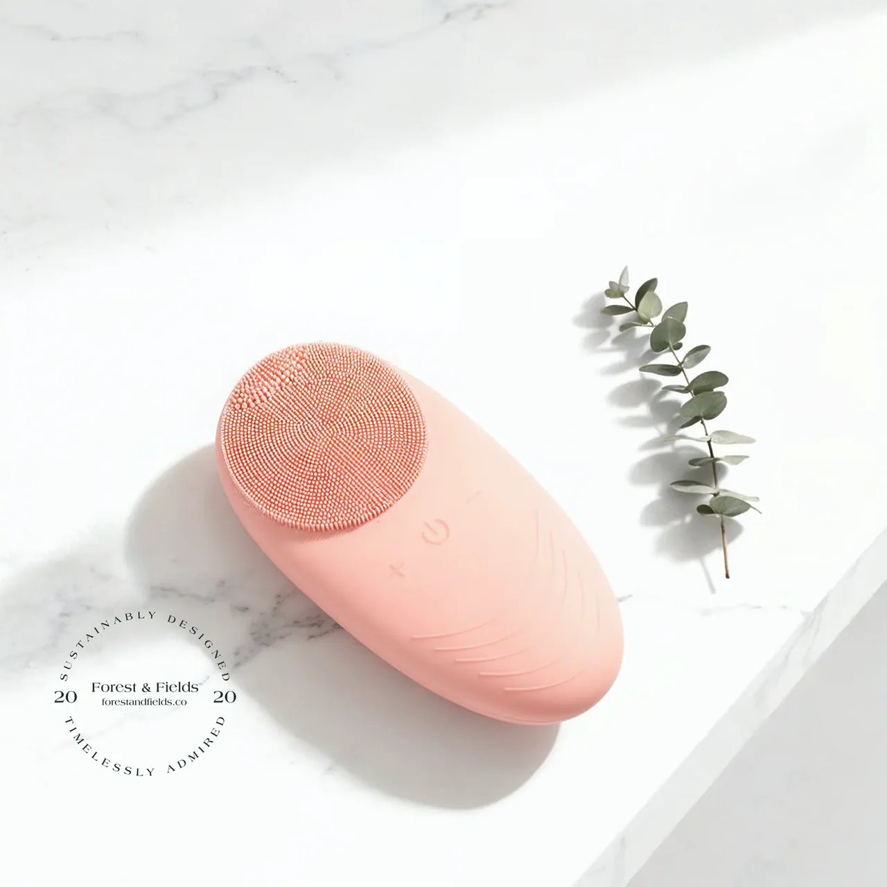 Purify™ silicone cleansing device on marble with eucalyptus